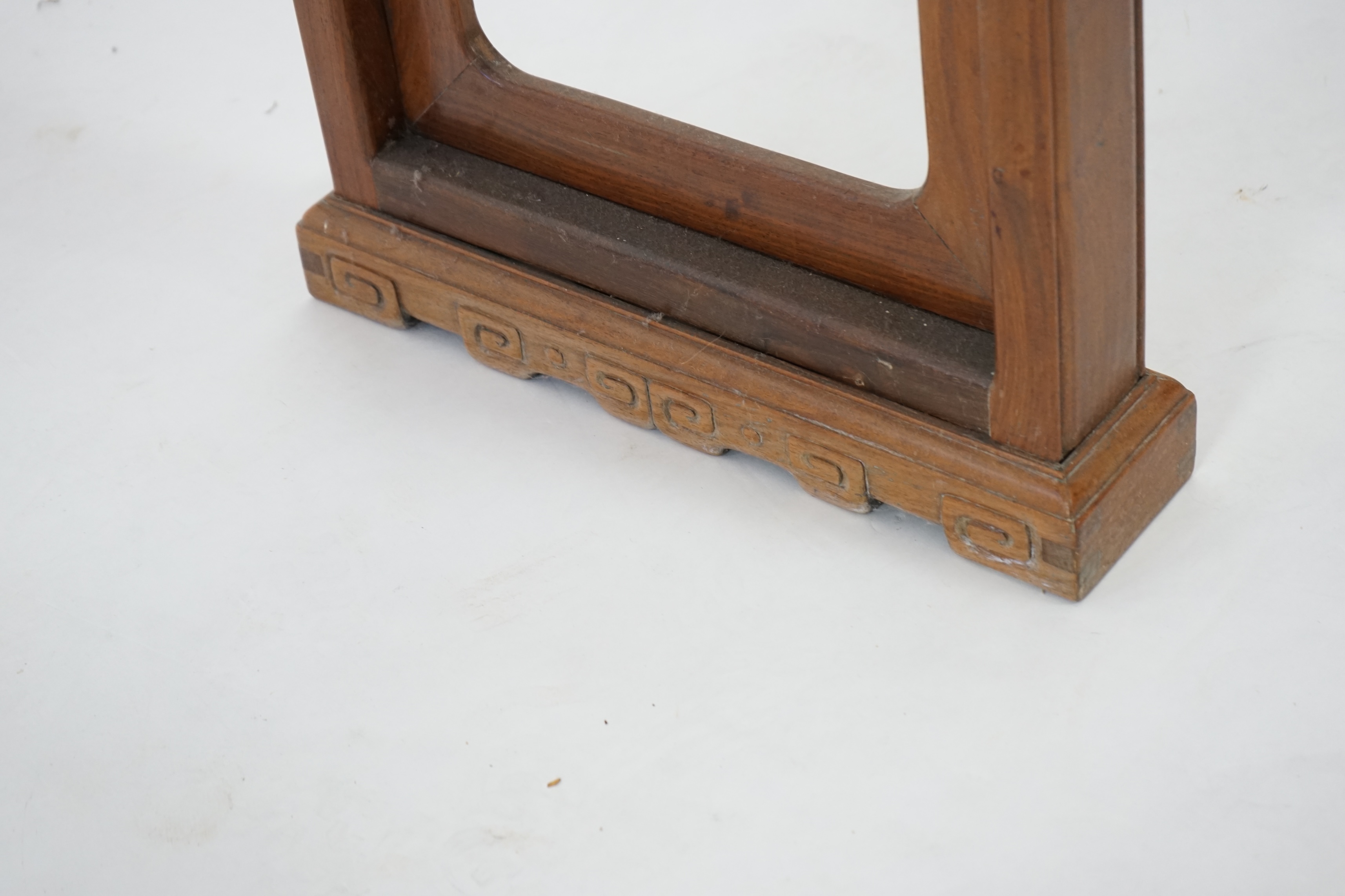 A Chinese padouk wood and jichimu altar table, the panelled rectangular top with scroll ends, on plain uprights headed by ruyi, 185cm wide, 94cm high. Condition - fair to good